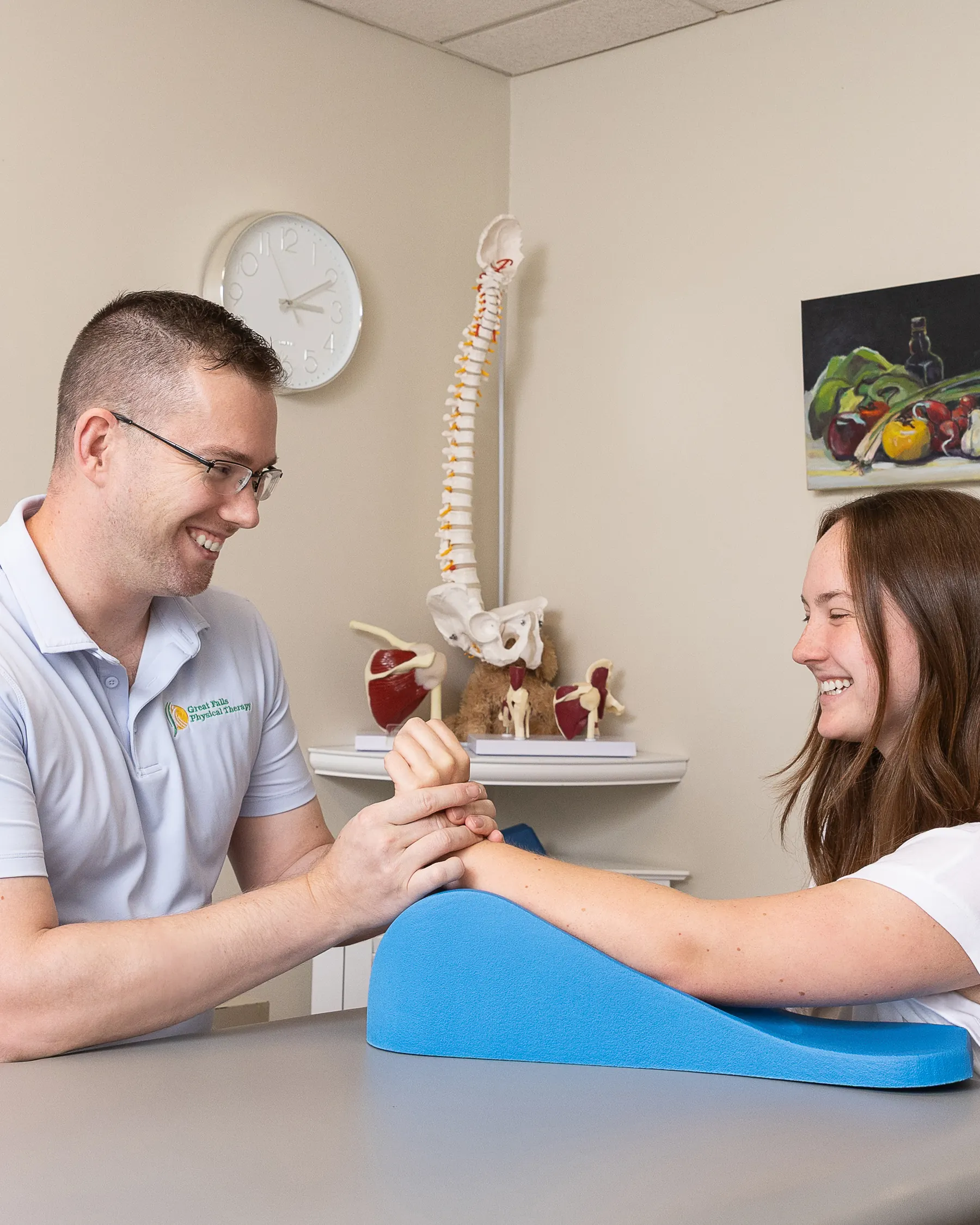 Physical therapist and patient during a hands-on evaluation