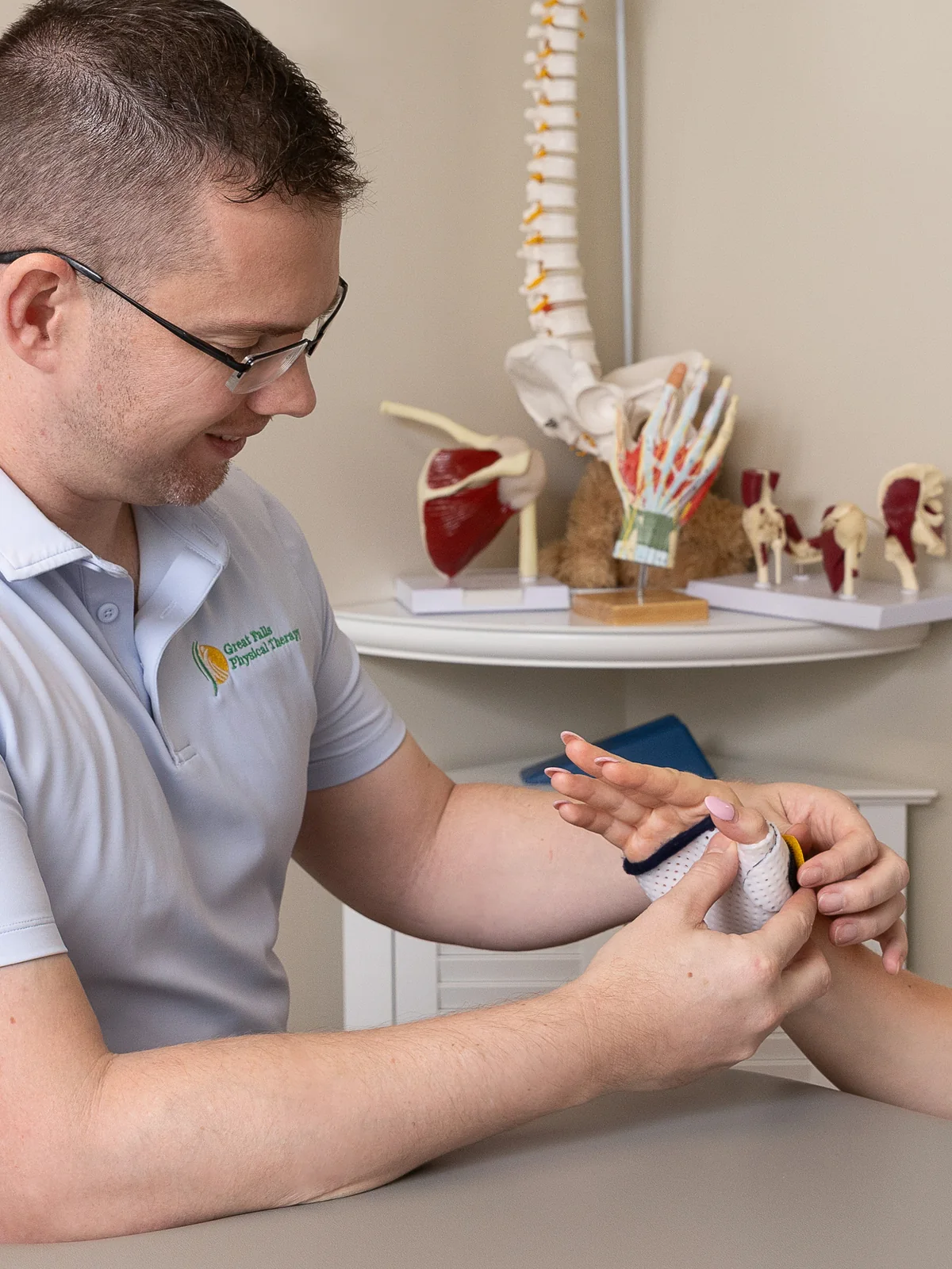 Hand therapist working on wrist mobility