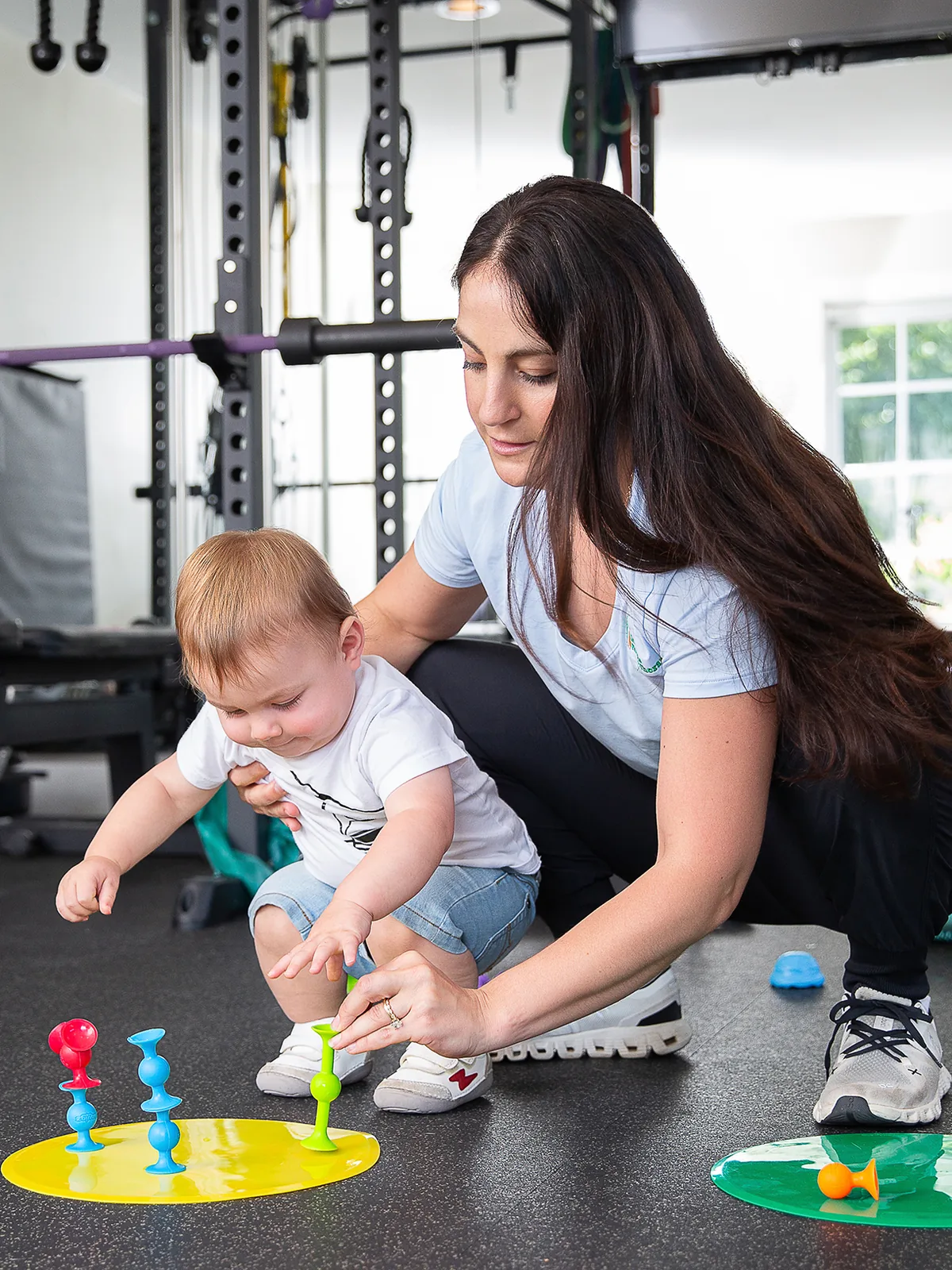 Pediatric physical therapist playing with a toddler